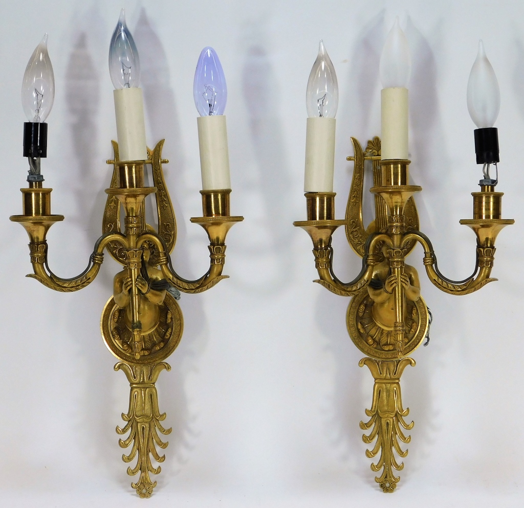 Appraisal: PR FRENCH EMPIRE PERIOD GILT BRONZE PUTTI SCONCES France th