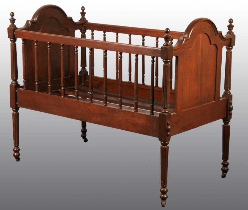 Appraisal: Wooden Victorian Era Child's Bed Description Mahogany wood Condition Excellent