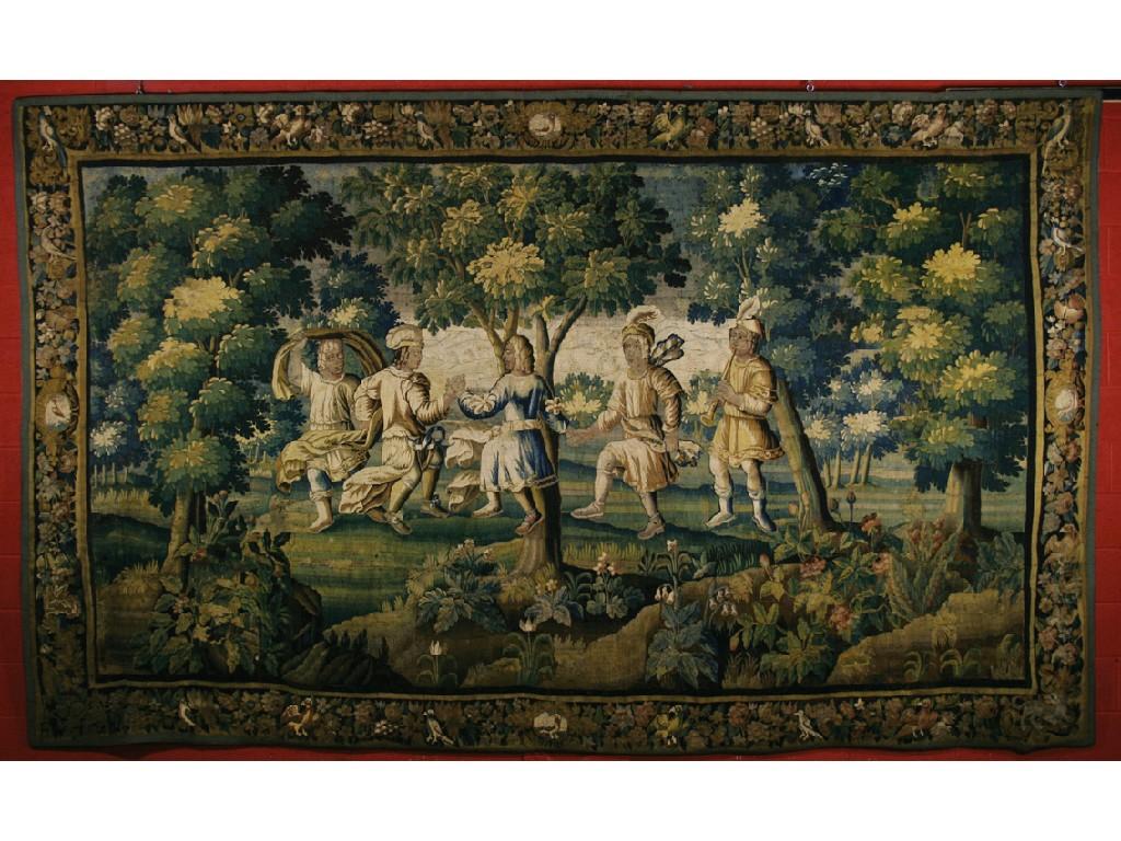 Appraisal: A VERDURE TAPESTRY worked with figures dancing and merrymaking in