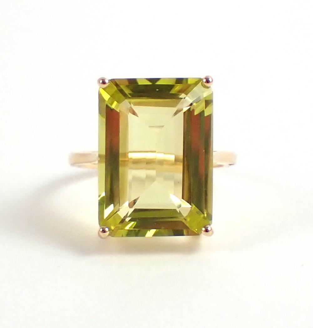 Appraisal: CITRINE AND FOURTEEN KARAT GOLD RING with four yellow gold