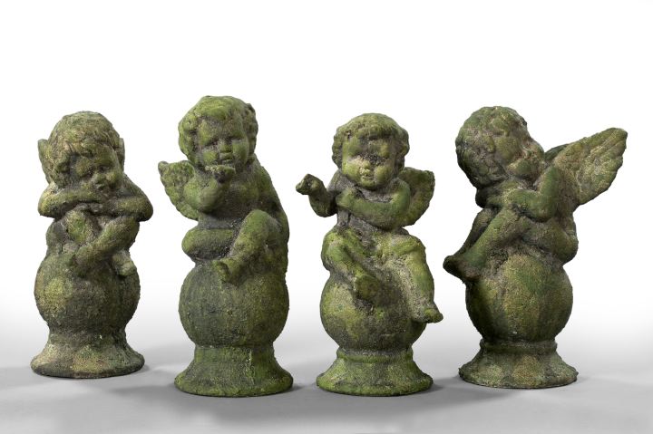 Appraisal: Group of Four Italian Terra Cotta Putti depicted perched on