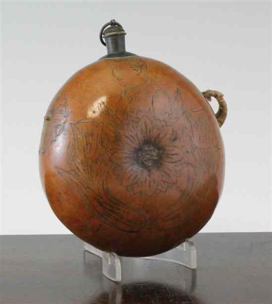 Appraisal: A late th century carved pilgrim flask decorated with a