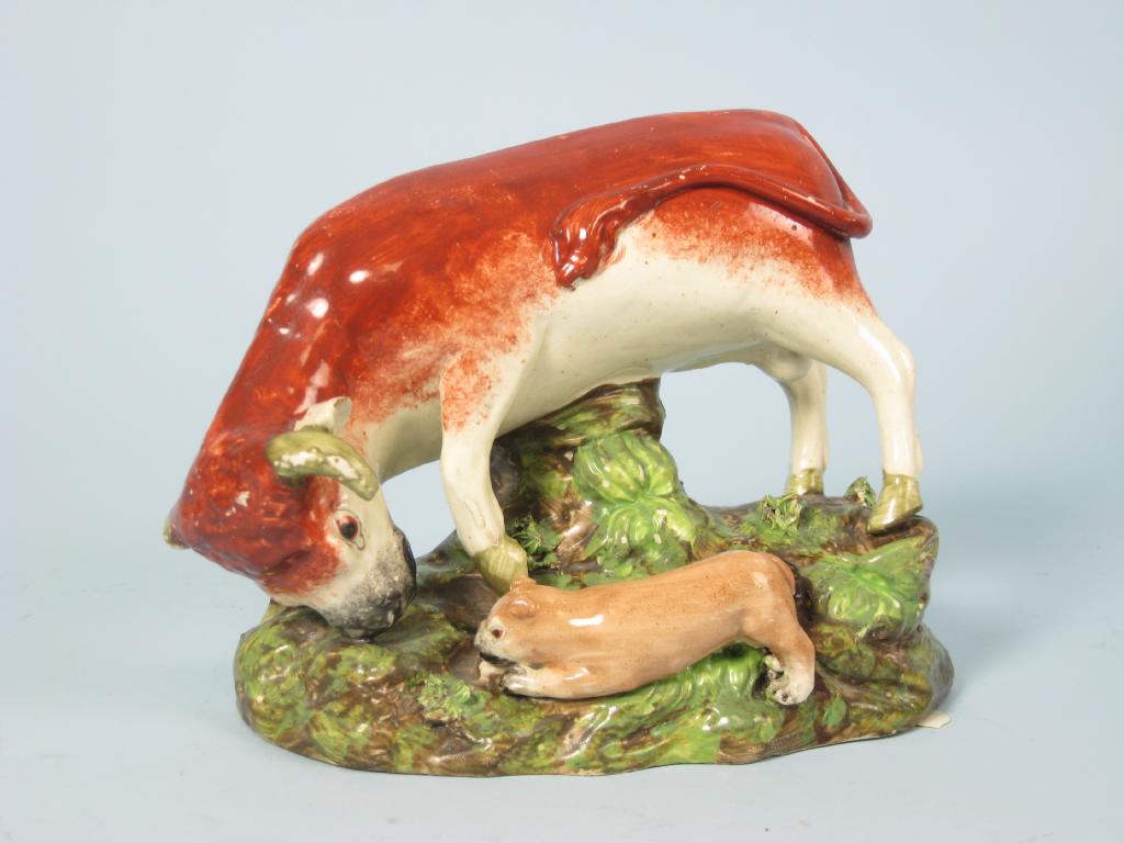 Appraisal: A th Century Staffordshire Bull Baiting Figure with painted details