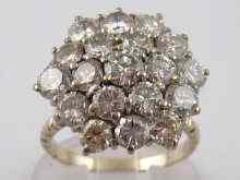 Appraisal: A white metal tests carat gold diamond cluster ring the