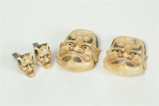 Appraisal: THREE IVORY MASK CARVINGS Japan st half- th century Pair