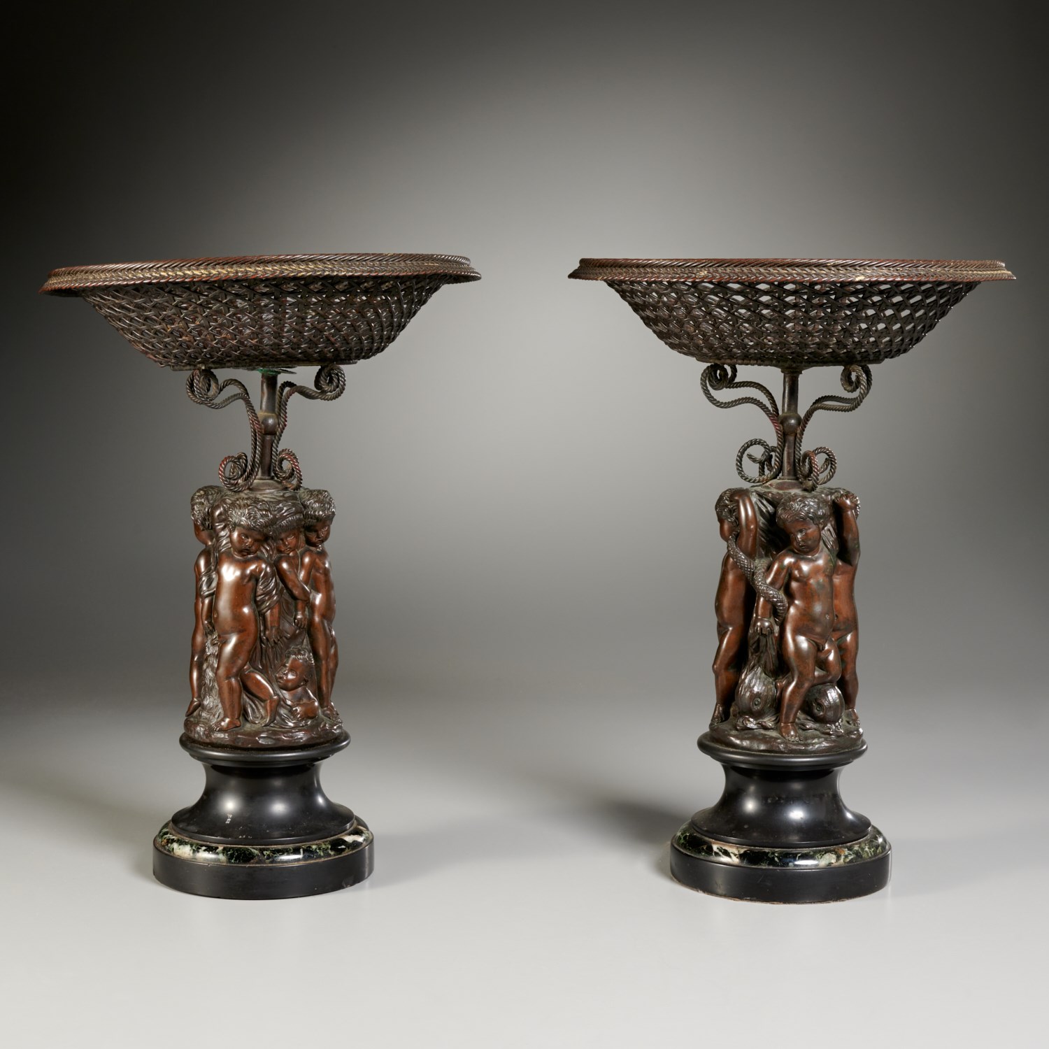 Appraisal: PAIR NEOCLASSICAL BRONZE CORBEILLE CENTERPIECES th c dark patinated cast