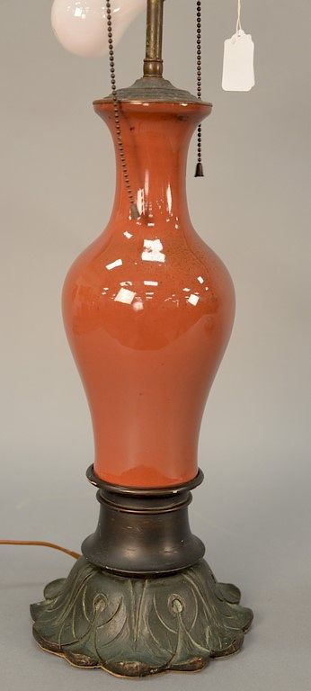 Appraisal: Chinese strawberry red glazed porcelain vase having slender body with