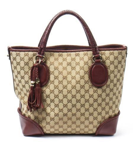 Appraisal: Gucci Marrakech handbag in beige monogrammed canvas having bordeaux leather