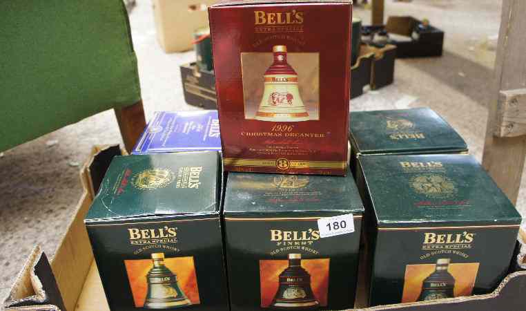 Appraisal: A collection of Wade Bells Whisky Decanters cl all boxed