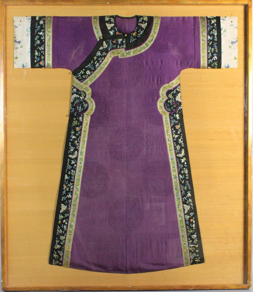 Appraisal: CHINESE MANCHU STYLE PURPLE SILK ROBE IN FRAME robe -