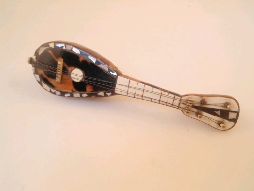 Appraisal: A miniature tortoiseshell covered model of a lute