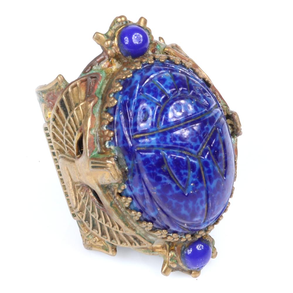 Appraisal: EGYPTIAN REVIVAL S ART DECO RING WITH LARGE CARVED BLUE