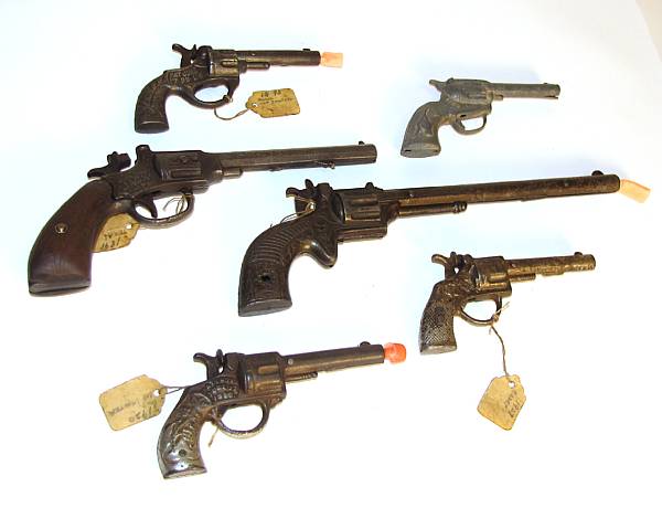 Appraisal: Assorted cast iron guns Sizes include American manufacturers includes a