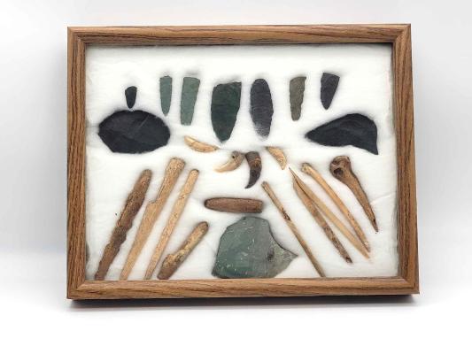 Appraisal: Group of Alaskan ArtifactsA framed display of assorted Alaskan artifacts