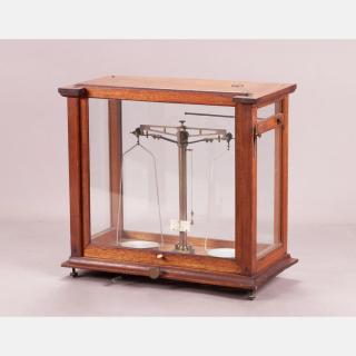 Appraisal: A Long Brass Beam Analytical Balance by Becker and Sons