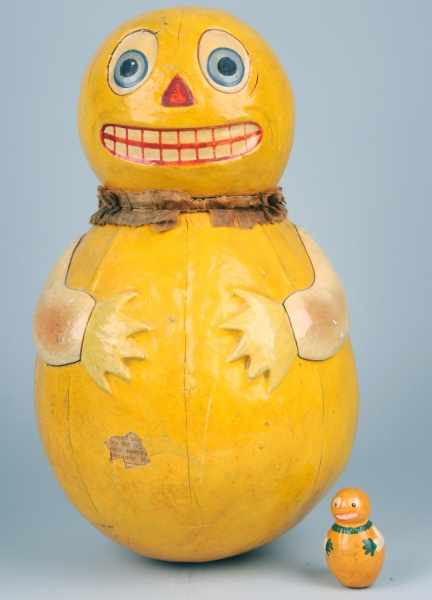 Appraisal: Huge Roly Poly Figural Pumpkin Candy Container Description Perhaps the