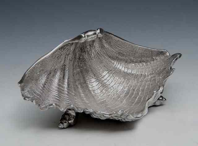 Appraisal: A CAST SILVER BUTTER DISH in the form of a