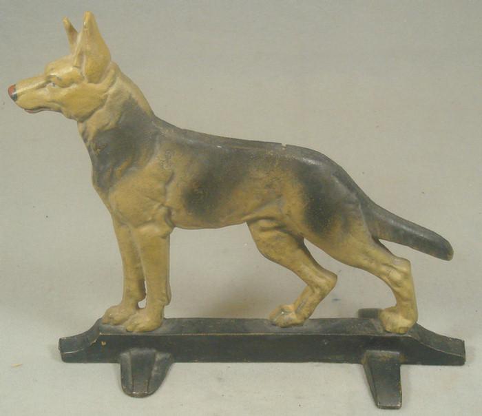 Appraisal: Cast iron doorstop large tan and black German Sheppard on