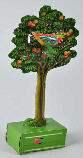 Appraisal: Tin Litho Bird in Tree Wind-Up Toy Description German Working