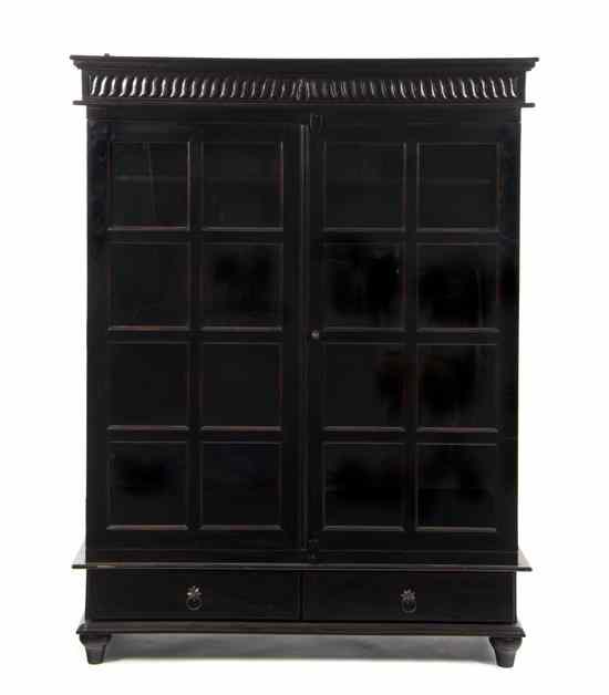 Appraisal: A Southeast Asian Style Bookcase contemporary having a molded cornice