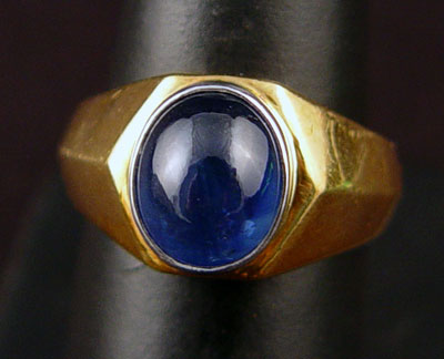 Appraisal: K CT CABOCHON SAPPHIRE RING K yellow gold ring contains