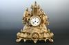 Appraisal: MANTEL CLOCK - French gilt metal figural mantel clock ca