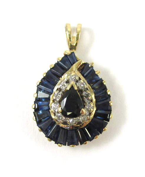 Appraisal: SAPPHIRE AND FOURTEEN KARAT GOLD PENDANT set with tapered baguette