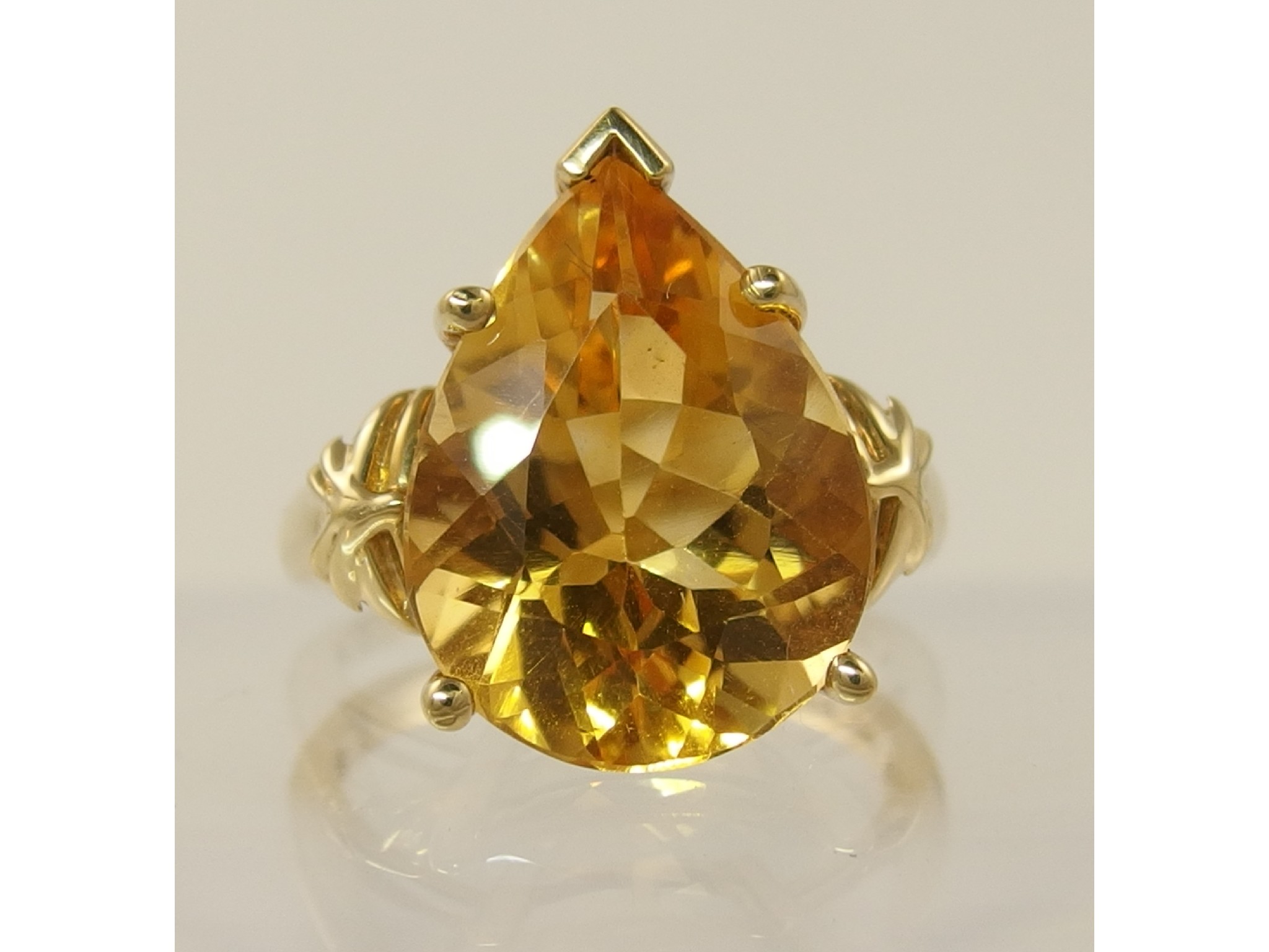 Appraisal: A ct gold ring set with a pear shaped citrineset