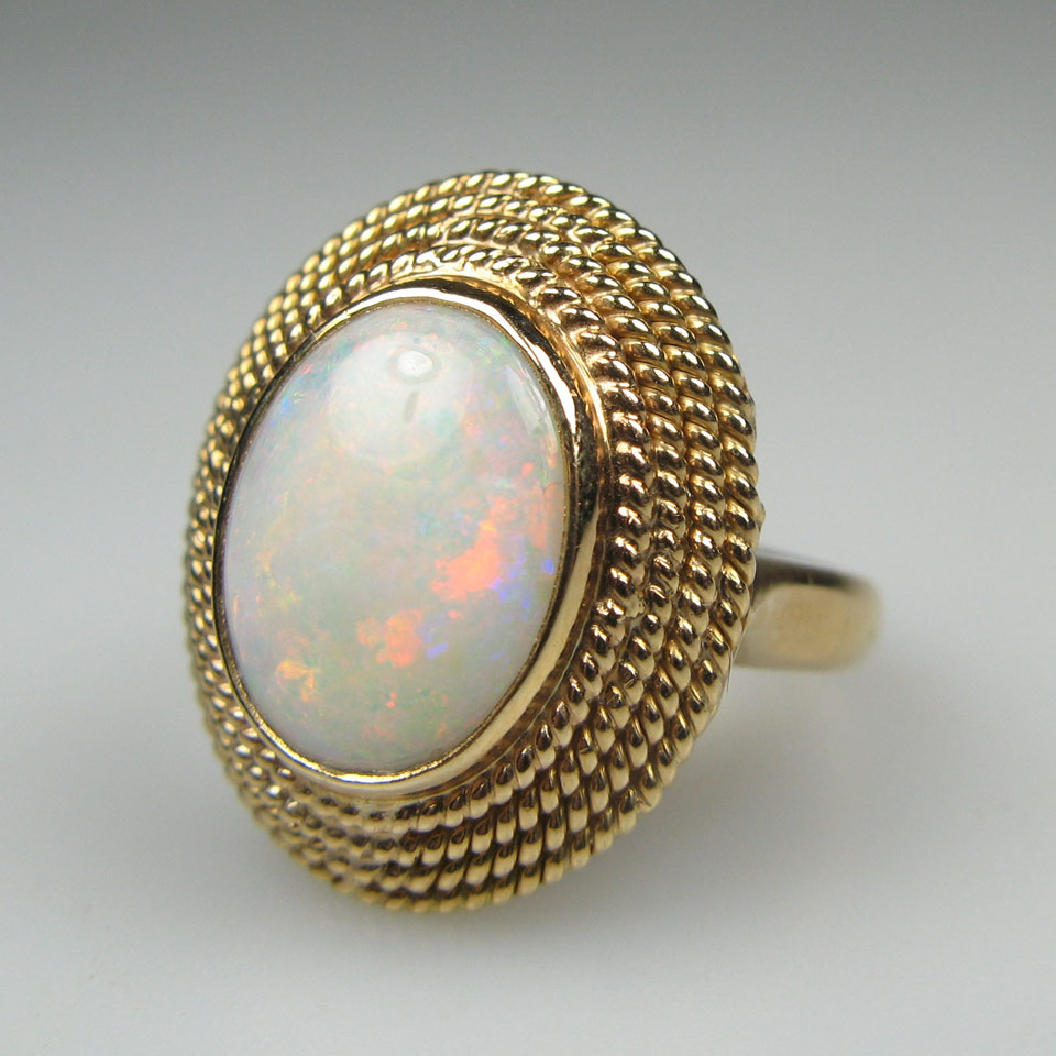 Appraisal: k Yellow Gold Ring set with an oval opal cabochon