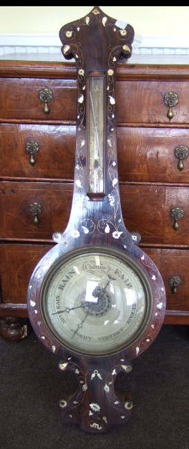 Appraisal: An early Victorian rosewood wheel barometer circa with an ogee