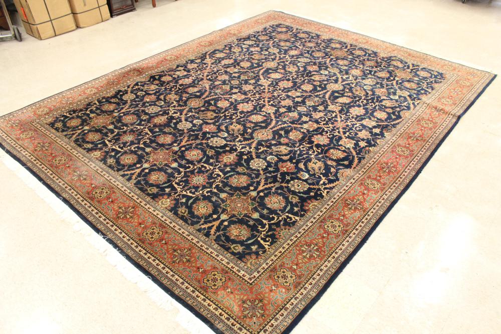 Appraisal: HAND KNOTTED ORIENTAL CARPET Indo-Persian overall floral design on blue