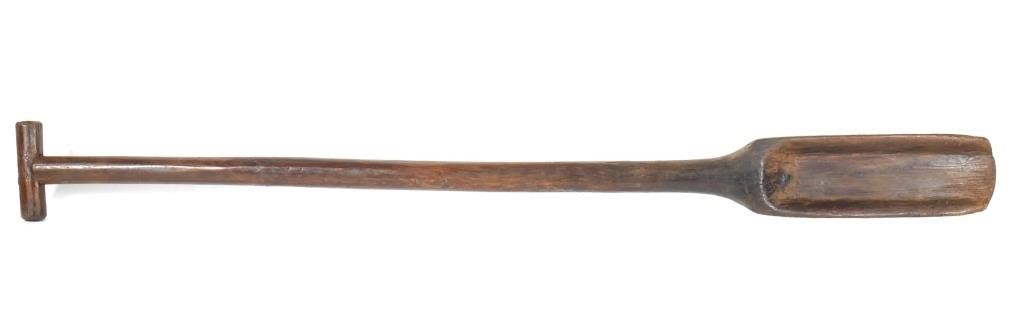 Appraisal: This appears to be a hand-carved paddle for stirring the