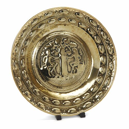 Appraisal: A th century Nuremberg brass alms dish of circular form