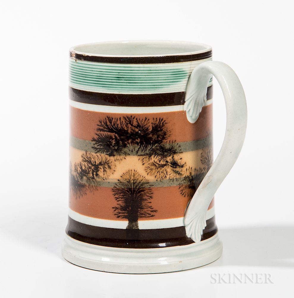 Appraisal: Mocha Pearlware and Slip-decorated Pint Mug Mocha Pearlware and Slip-decorated