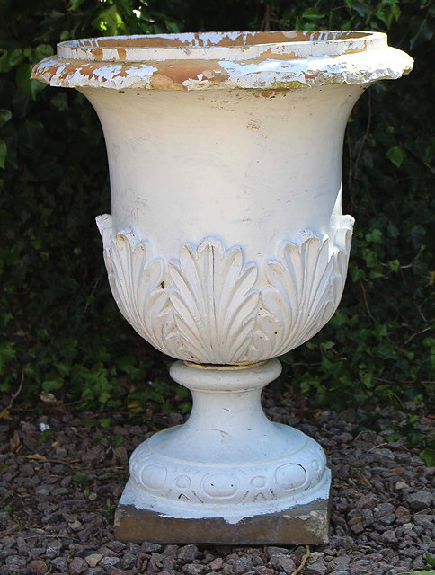 Appraisal: A VICTORIAN BUFF TERRACOTTA URN of campana form with acanthus