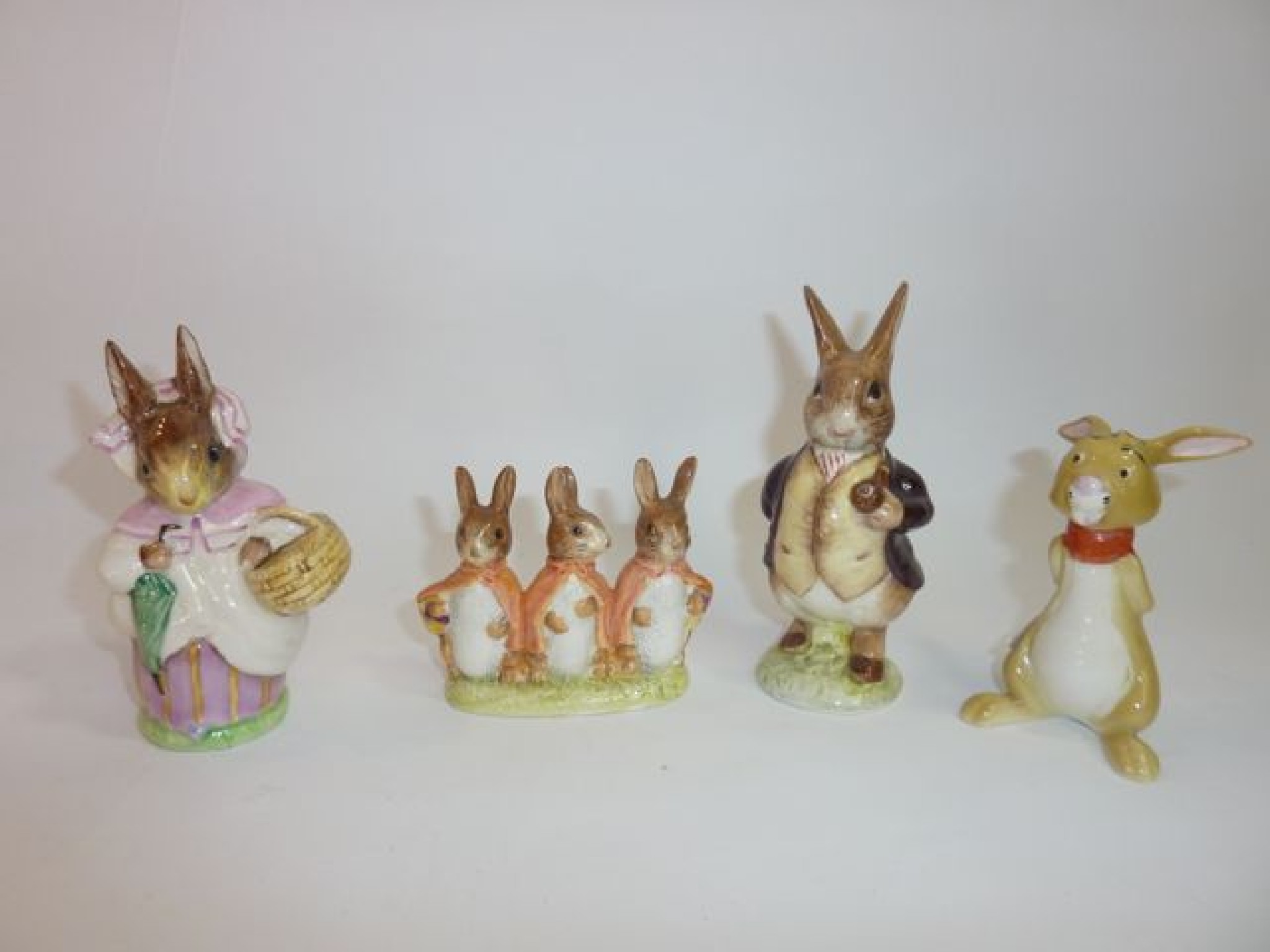 Appraisal: Three Beswick Beatrix Potter figures all representing rabbits including Mrs