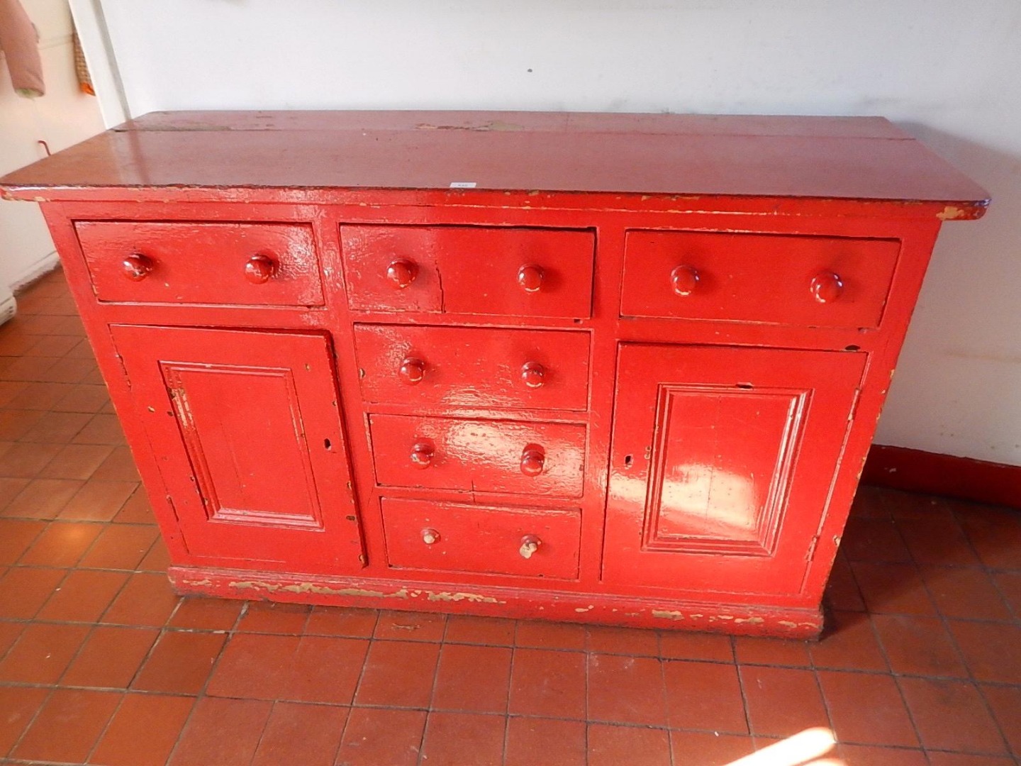 Appraisal: A Victorian red painted pine dresser base fitted with six