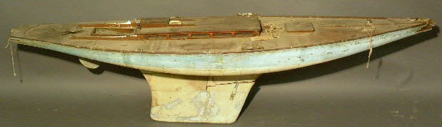 Appraisal: Plank-on-frame pond model c with mahogany deck and lead keel