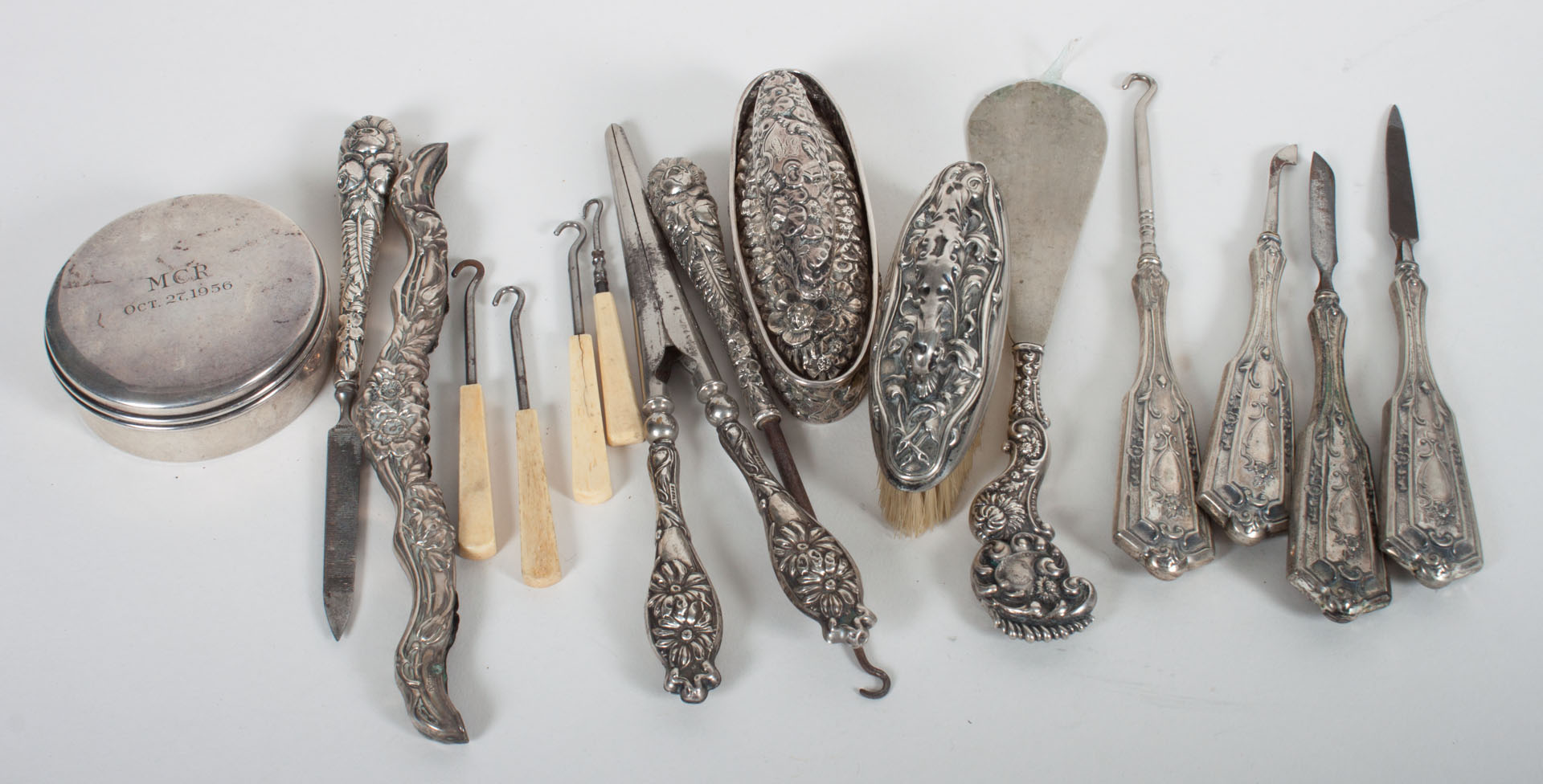 Appraisal: Group of sterling silver handled personal items including Simons Bros