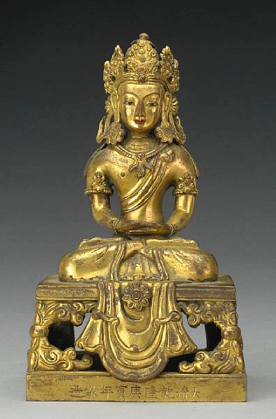 Appraisal: A gilt bronze seated Amitayus Qianlong Mark and Period The