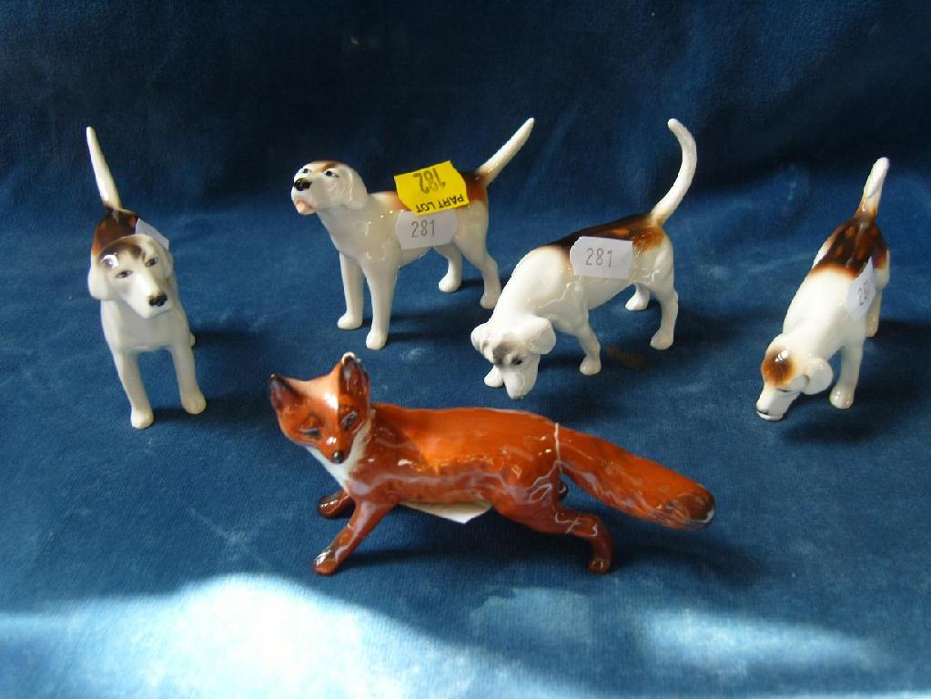 Appraisal: A set of four Beswick hounds in different positions together