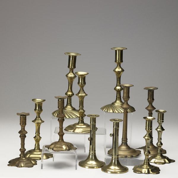 Appraisal: ENGLISH BRASS BELL METAL CANDLESTICKS Six pairs in various styles