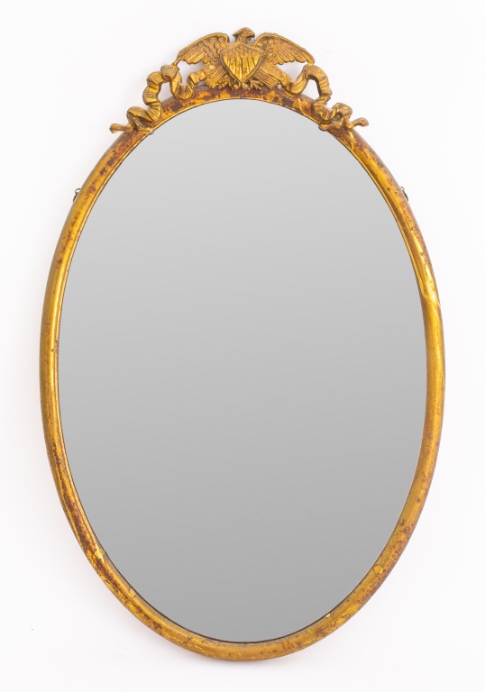 Appraisal: AMERICAN CHASED GILT METAL MEDAILLON MIRROR American chased gilt metal