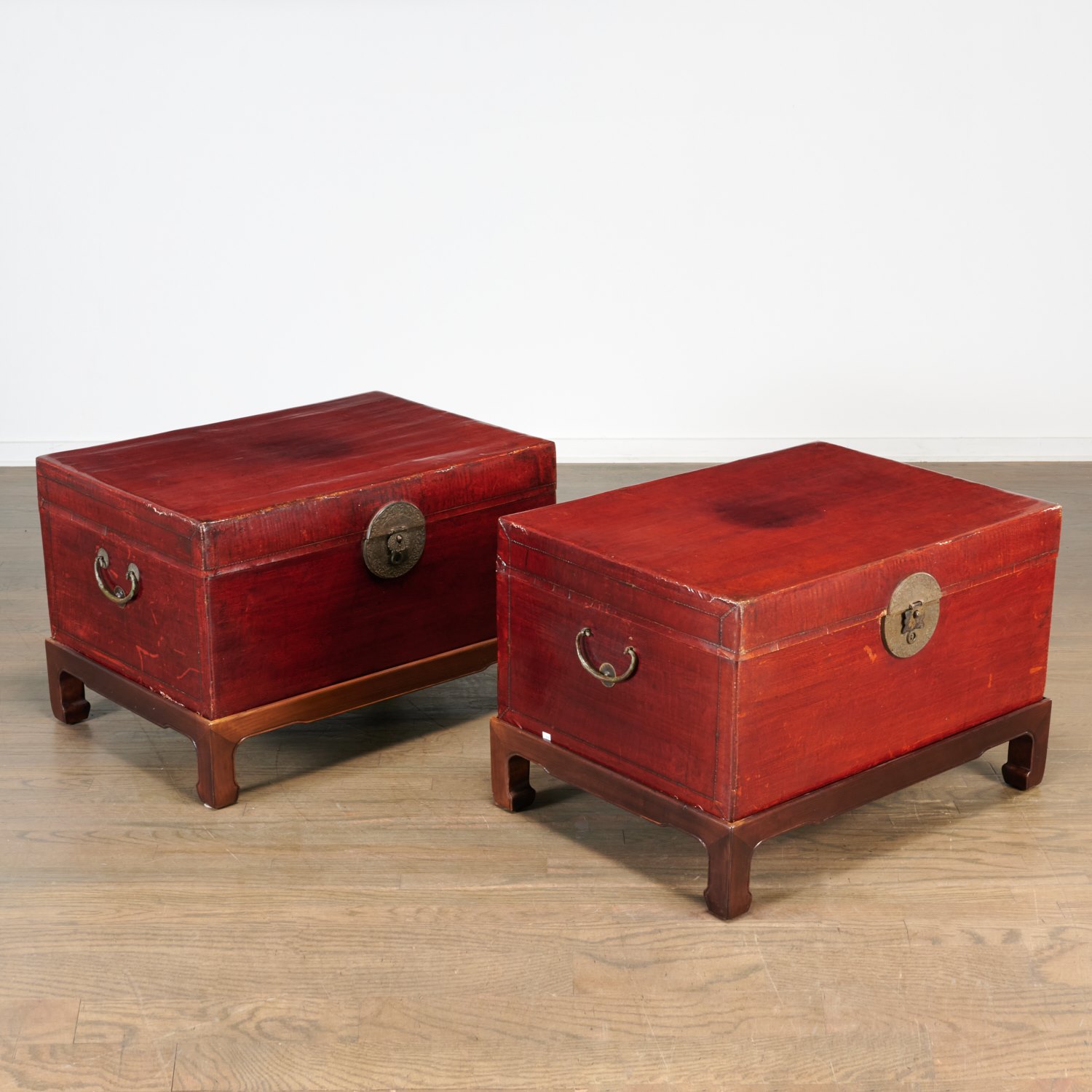 Appraisal: PAIR CHINESE BRASS MOUNTED RED LACQUERED TRUNKS th th c