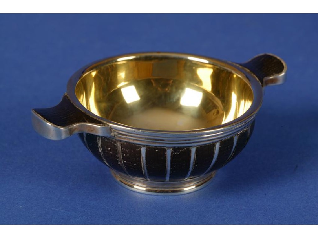 Appraisal: A SCOTTISH PROVINCIAL SILVER-GILT MOUNTED QUAICHE with a reeded border