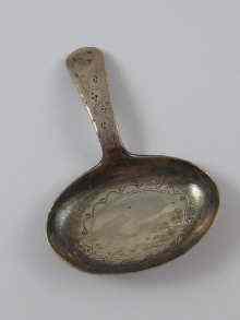 Appraisal: A Georgian silver caddy spoon the oval bowl and handle