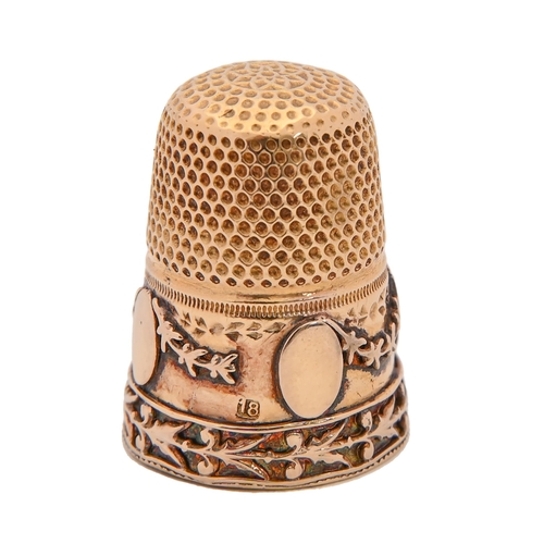 Appraisal: A gold thimble c the skirt applied with festoons and