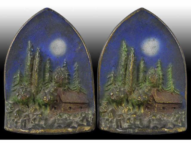 Appraisal: Cabin in Woods Cast Iron Bookends Description Scene of rustic