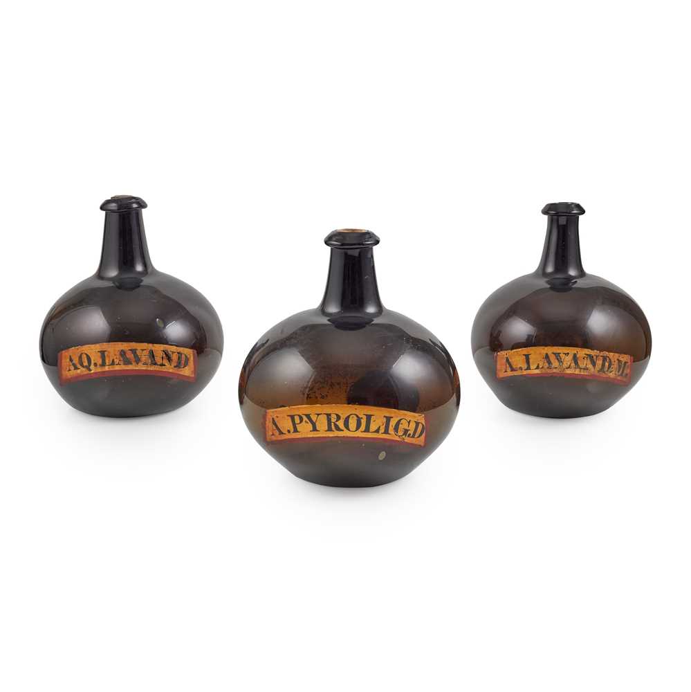 Appraisal: SET OF THREE LARGE AMBER GLASS APOTHECARY BOTTLES EARLY TH