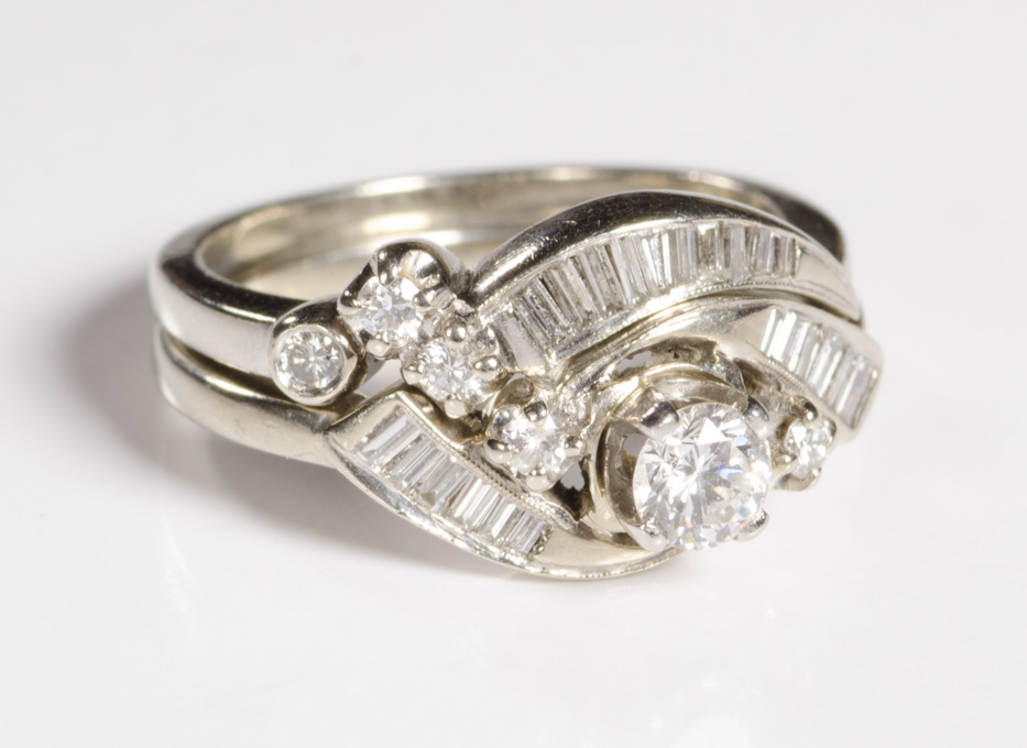 Appraisal: DIAMOND AND FOURTEEN KARAT GOLD WEDDING SET The white gold